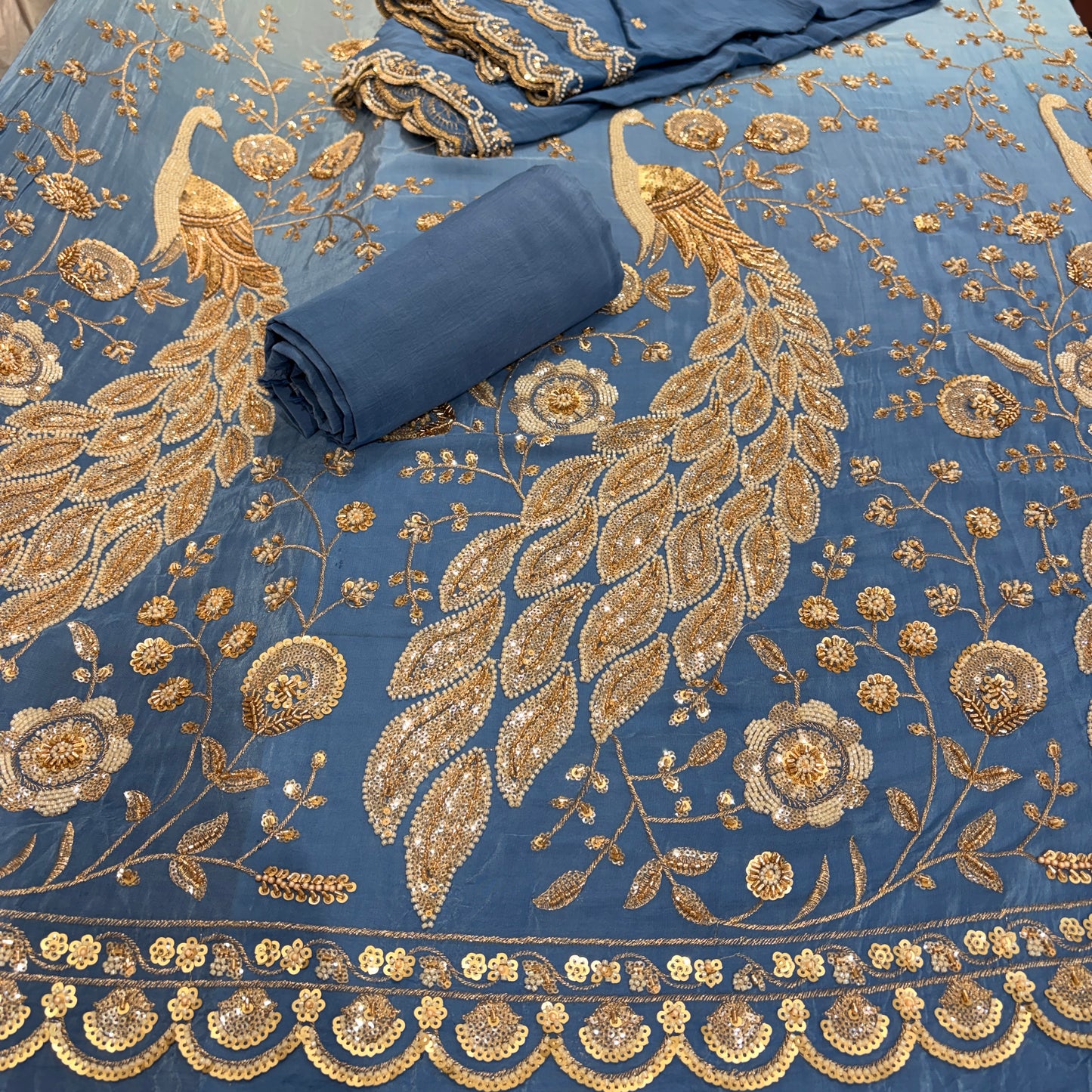 Peacock Crepe Cutdana Nalki Work Unstitched Suit